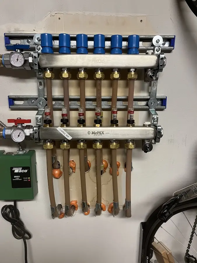 Plumber performing Water Heater Repair at a residential property in Henderson